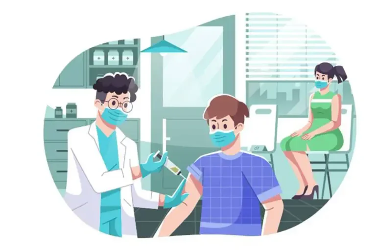 Läkare med munskydd ger en vaccination till en patient som sitter på en stol i en klinik, medan en annan person sitter och väntar i bakgrunden.